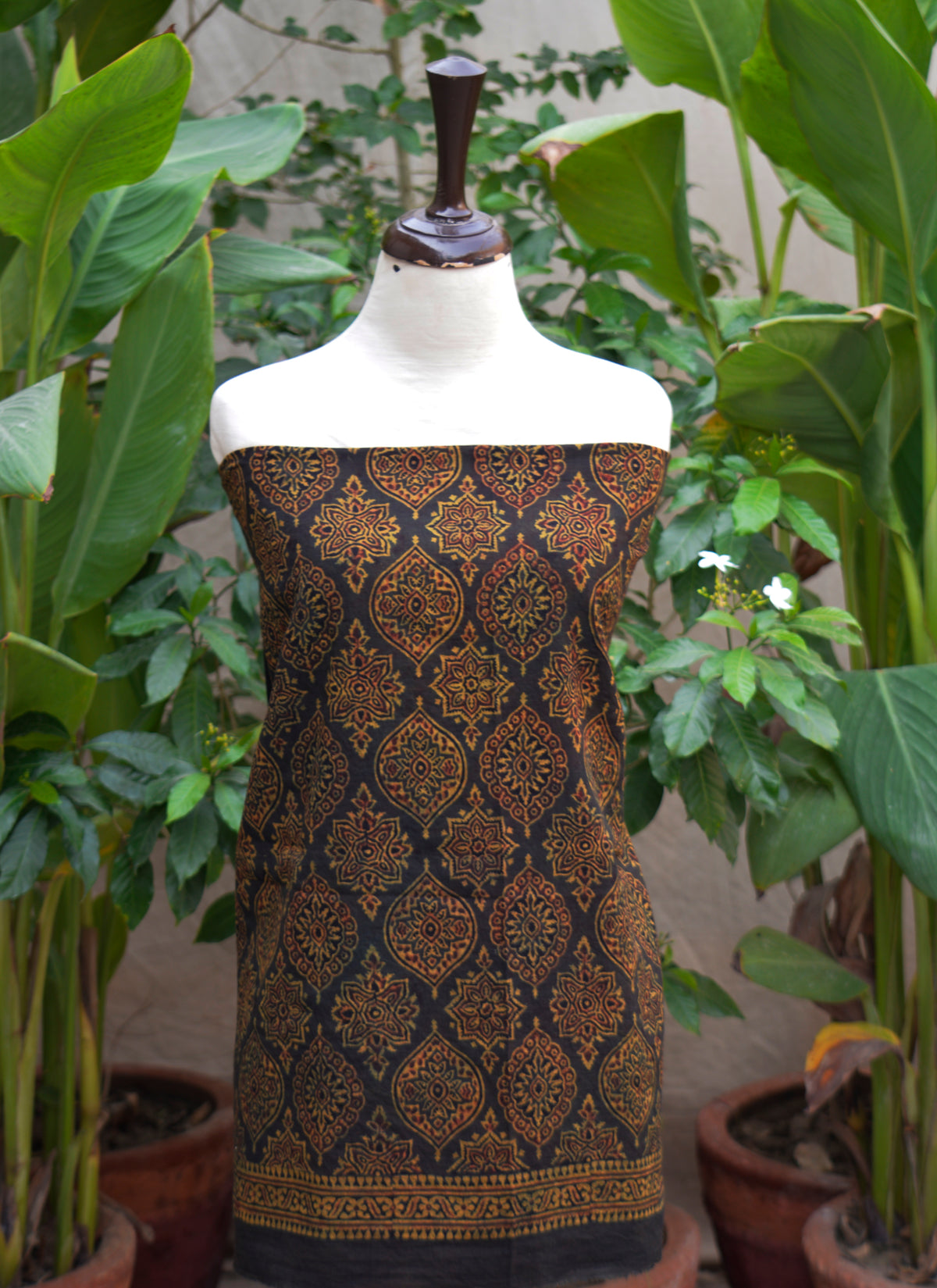 Hand block printed Ajrak Badam dark green and maroon two-piece unstitched set heritage textile Pakistan