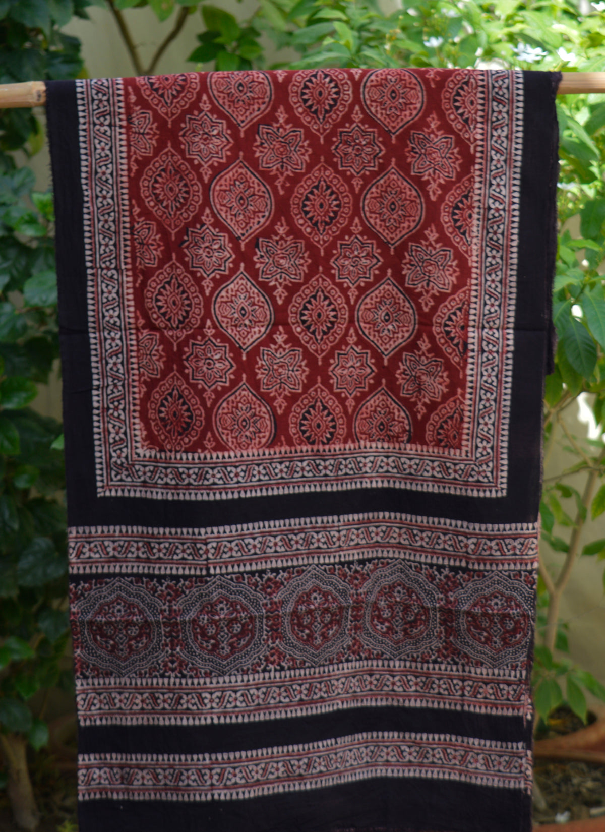 Lightweight lawn Ajrak scarf featuring traditional Badam artisan motifs