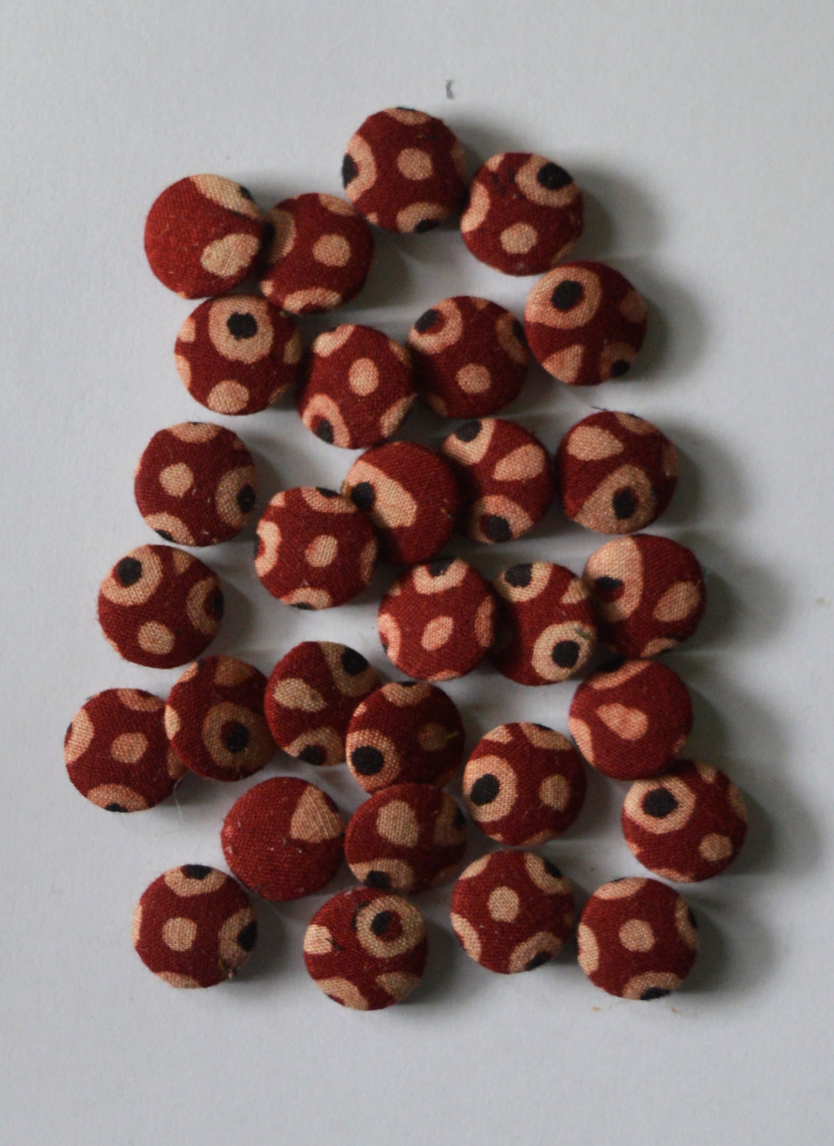 Premium artisan Ajrak fabric buttons made with organic dye hand block printed fabric