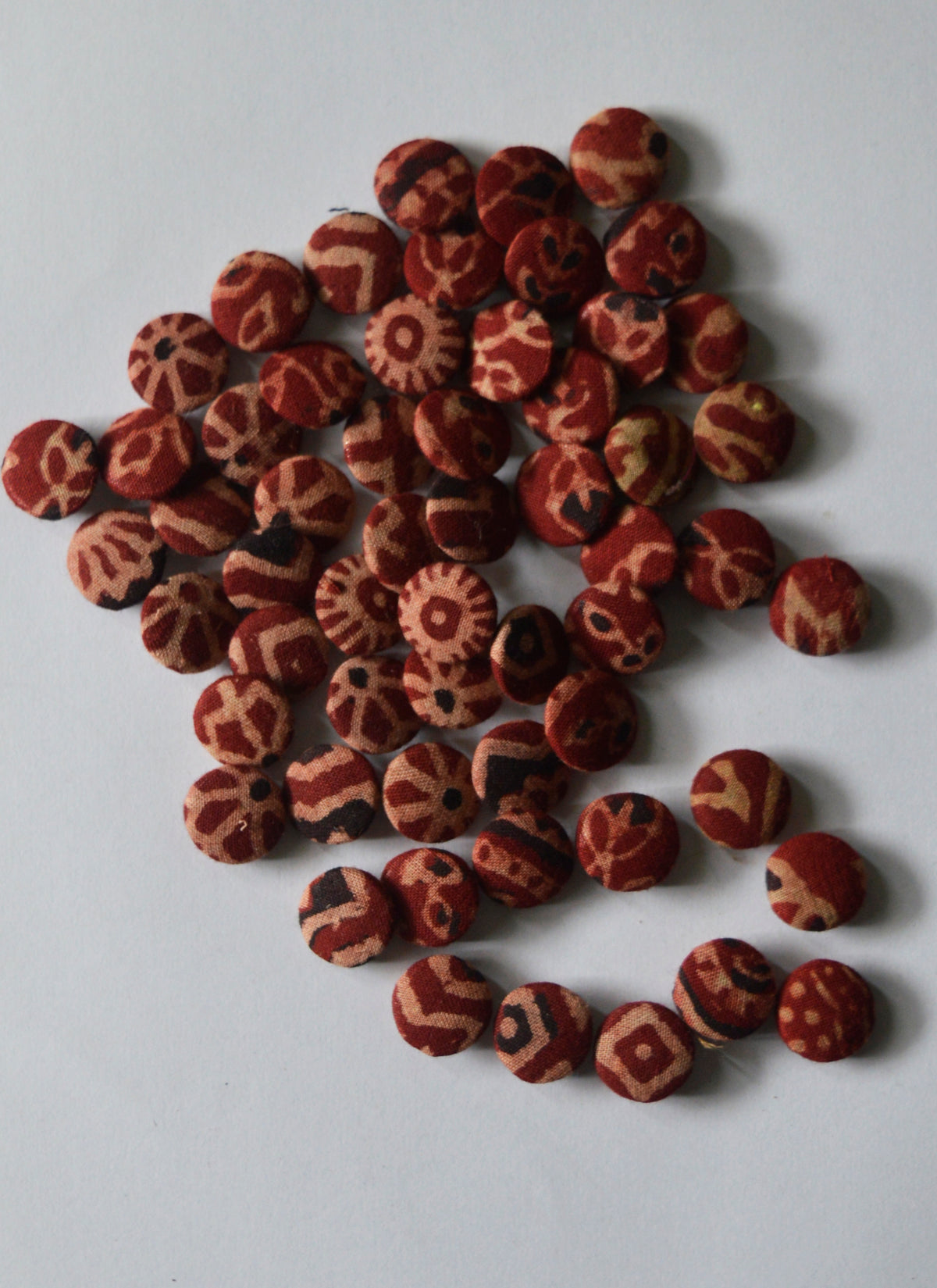 Traditional Ajrak fabric covered buttons for DIY crafts and garment embellishment