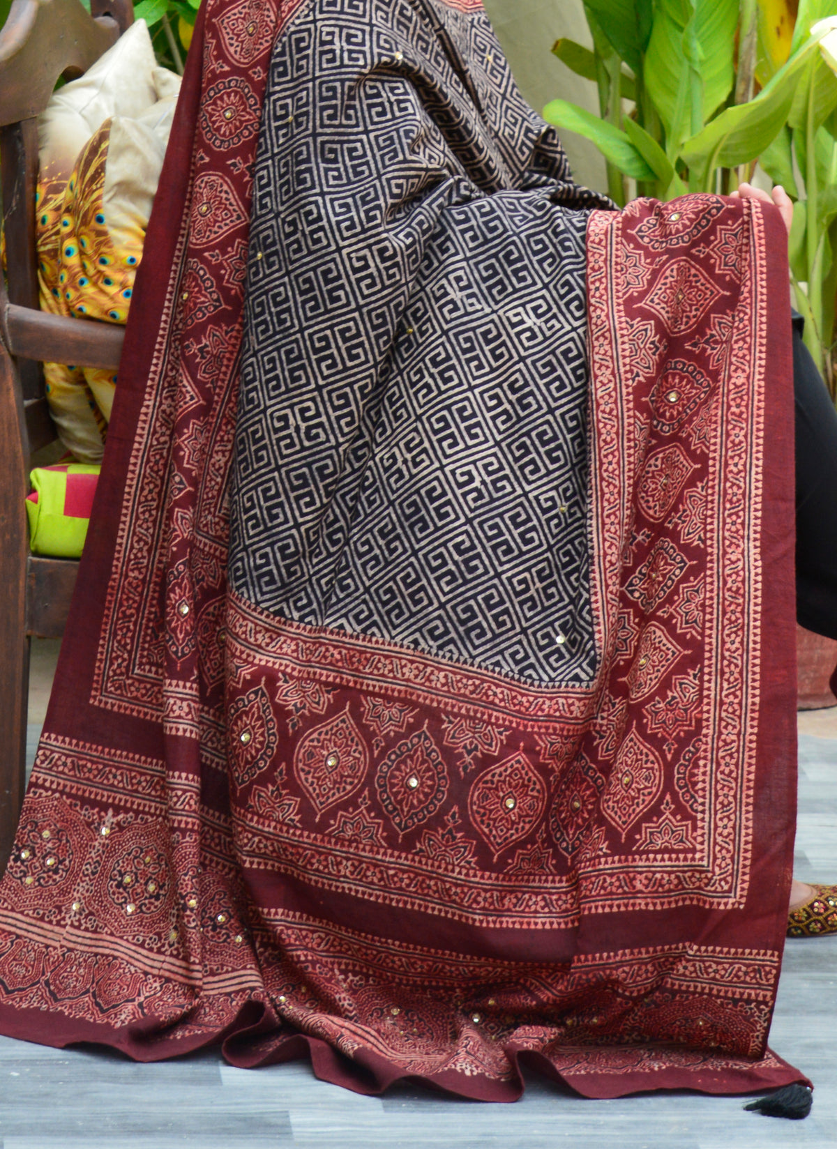 Traditional Sindhi Ajrak wrap with sparkling sitara studs, thread tassels, and eco-friendly organic dyes