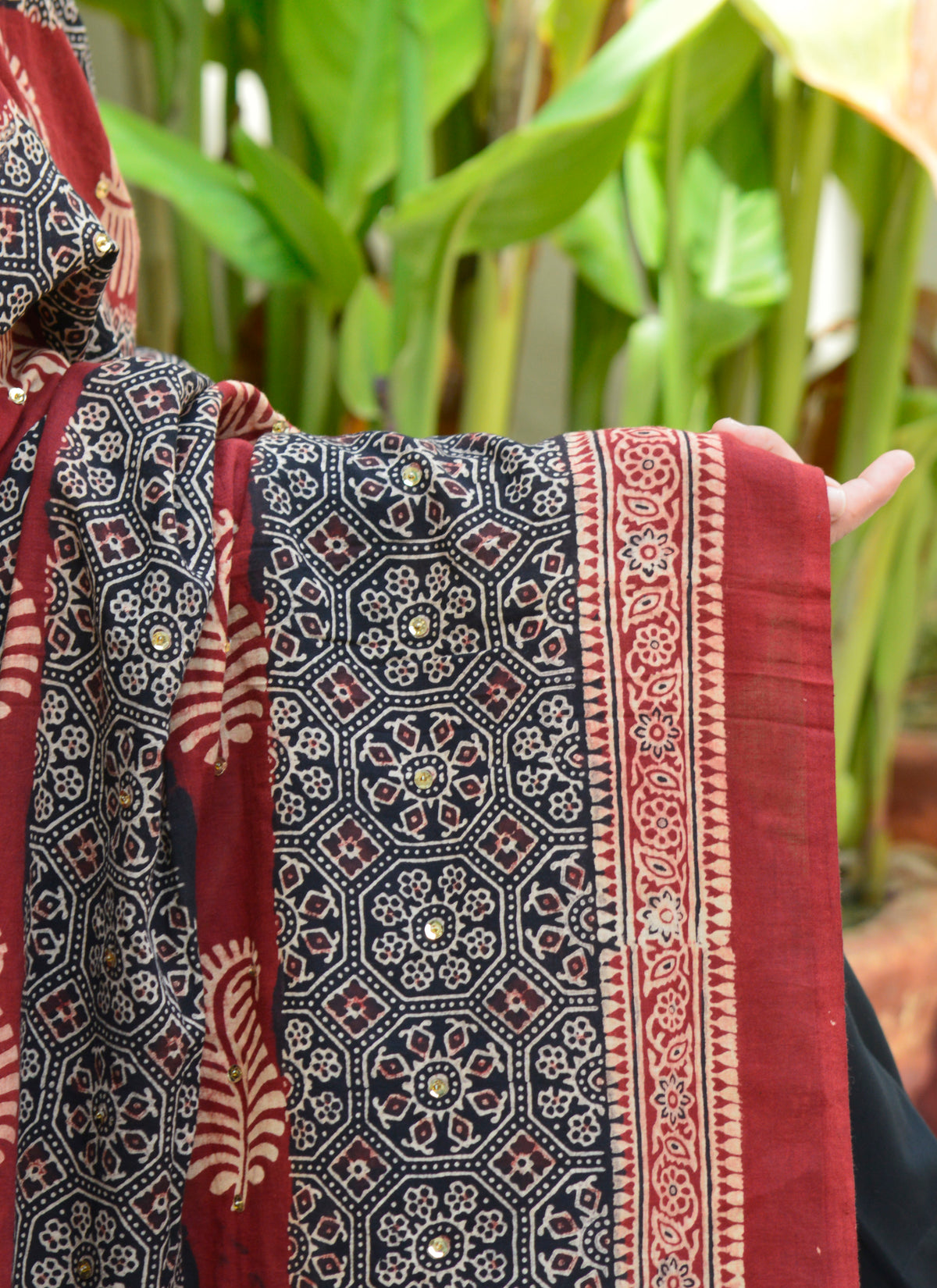 Traditional leafy motif Ajrak Chaadar in organic cotton with hand block print, studs, and decorative tassels