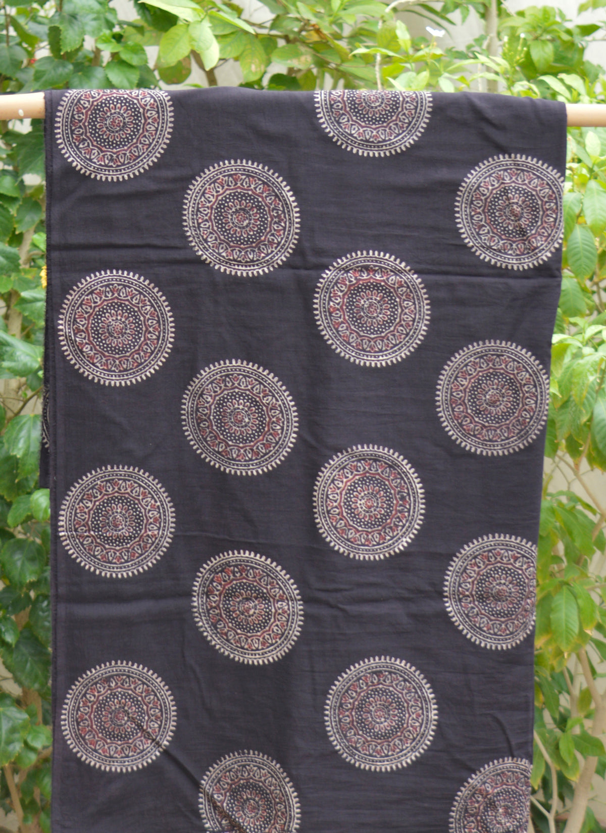 Hand block printed Ajrak fabric in black and burgundy for kurta, shirt, and top stitching