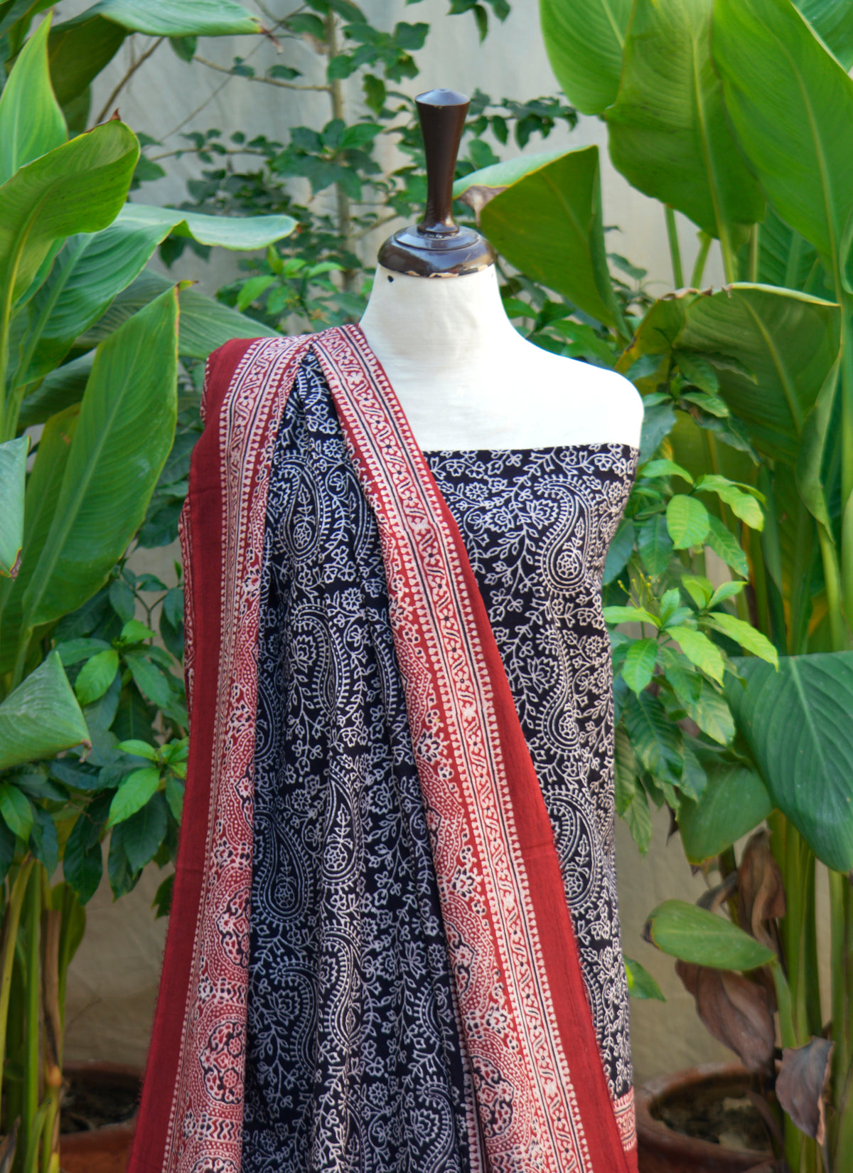 Handcrafted Ajrak Anbi Contrast red and black lawn dress featuring organic dyes and traditional Sindhi block print motifs