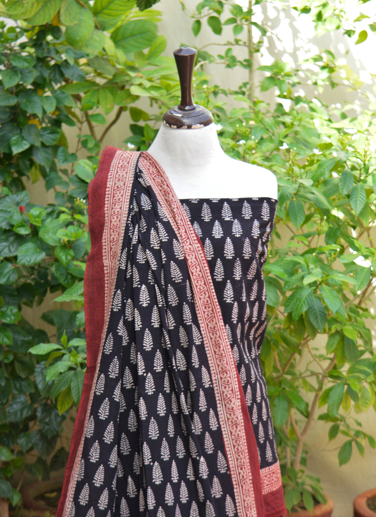 Hand block printed black contrast Ajrak lawn dress fabric with Mountain Butta motifs
