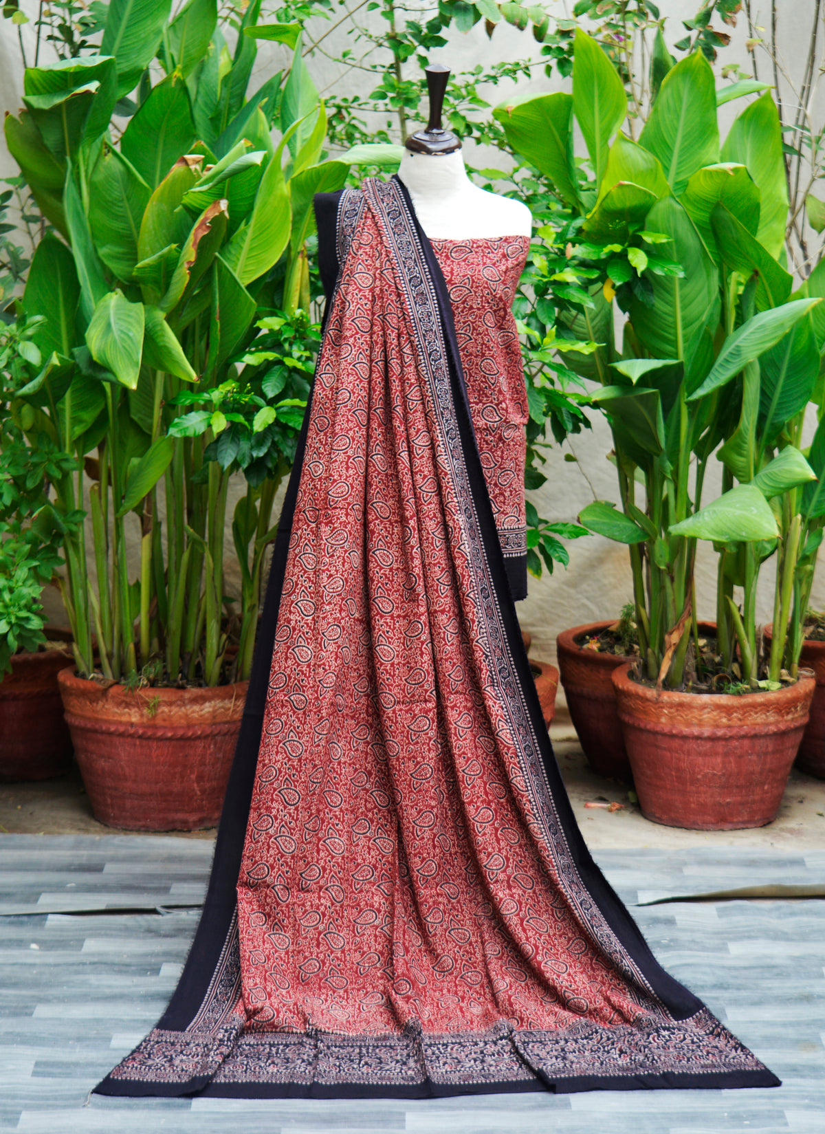 Detailed texture of paisley bandana Ajrak Design Dress lawn two-piece fabric, traditional Sindhi craft and organic dye printing.