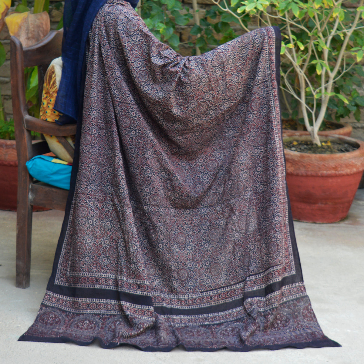 Black Ajrak Chadar with Traditional Skin Tones Print and Hand Block Printed Design by Sartiyoon