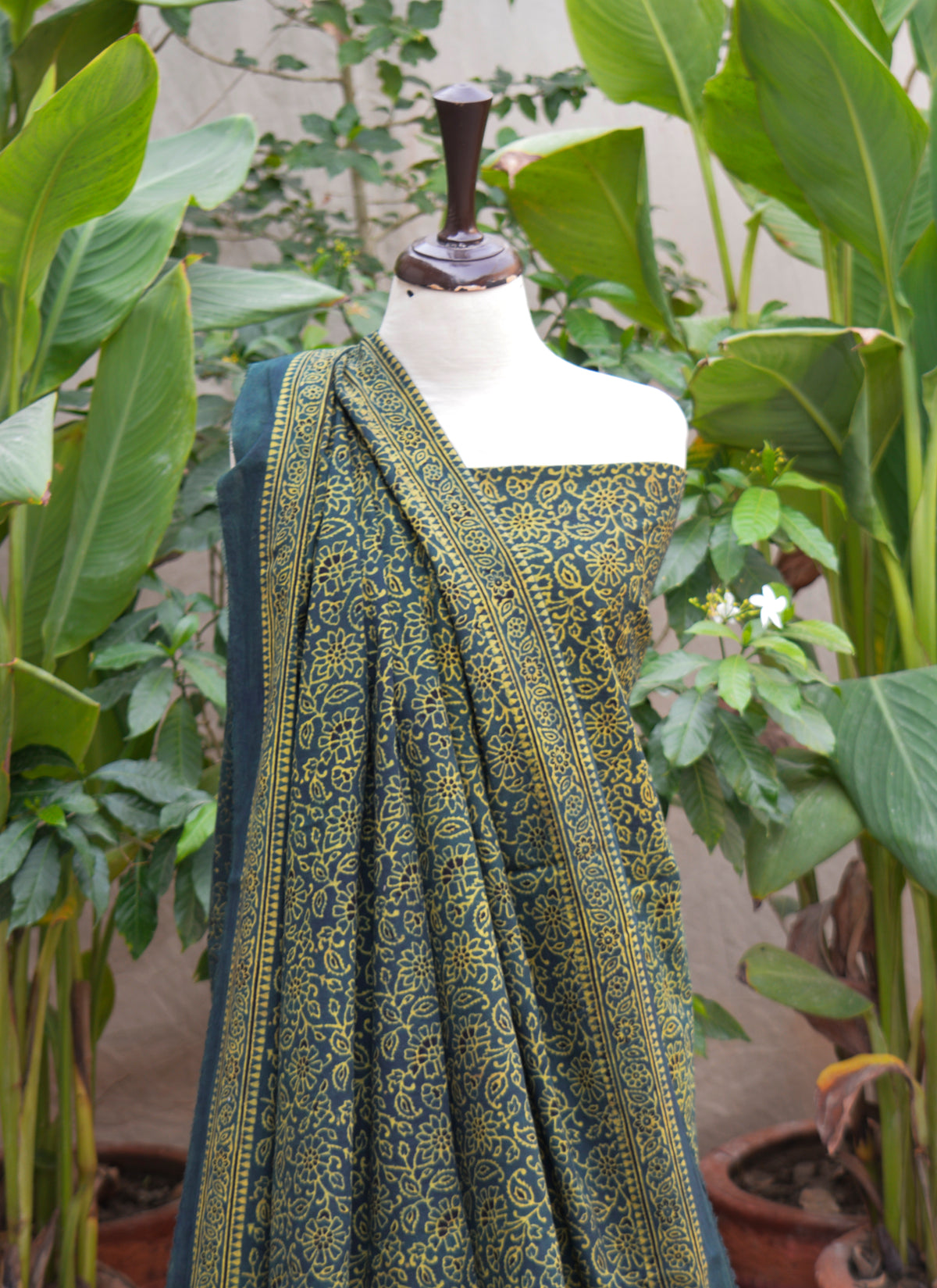 Traditional Sindhi Ajrak Design Dress in green floral bel pattern made with organic dyes on soft cotton fabric.