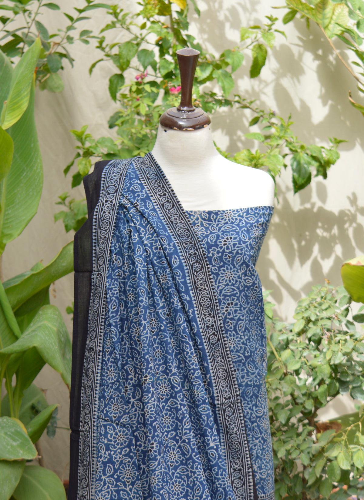 Sindhi artisan-made Ajrak dress in indigo with floral motifs and eco-friendly dyes