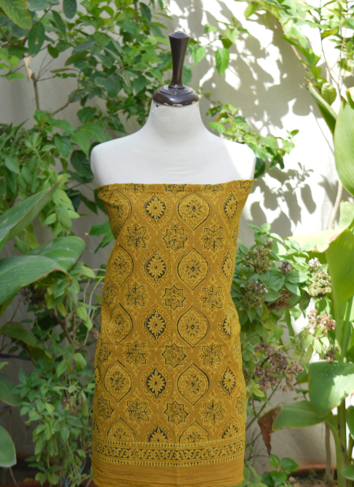 Eco-friendly Ajrak mustard shirt and dupatta set with hand block printed badam design on soft lawn fabric.