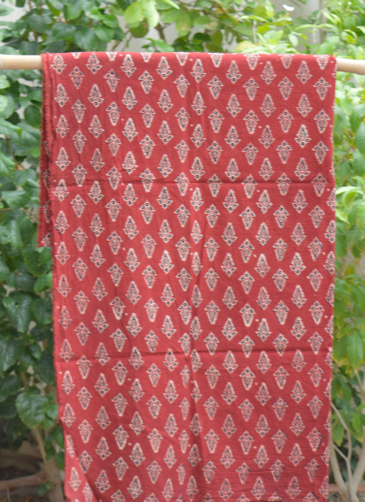 Organic style hand block printed red Ajrak lawn fabric for women's clothing