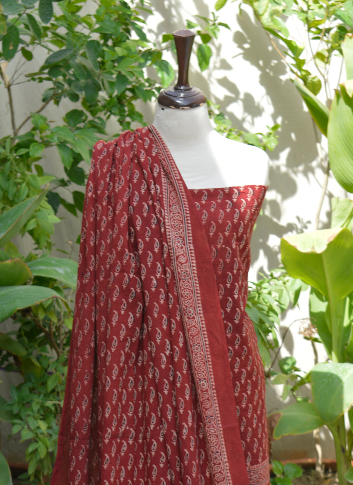 Traditional Ajrak paisley print unstitched red outfit made from breathable organic lawn fabric