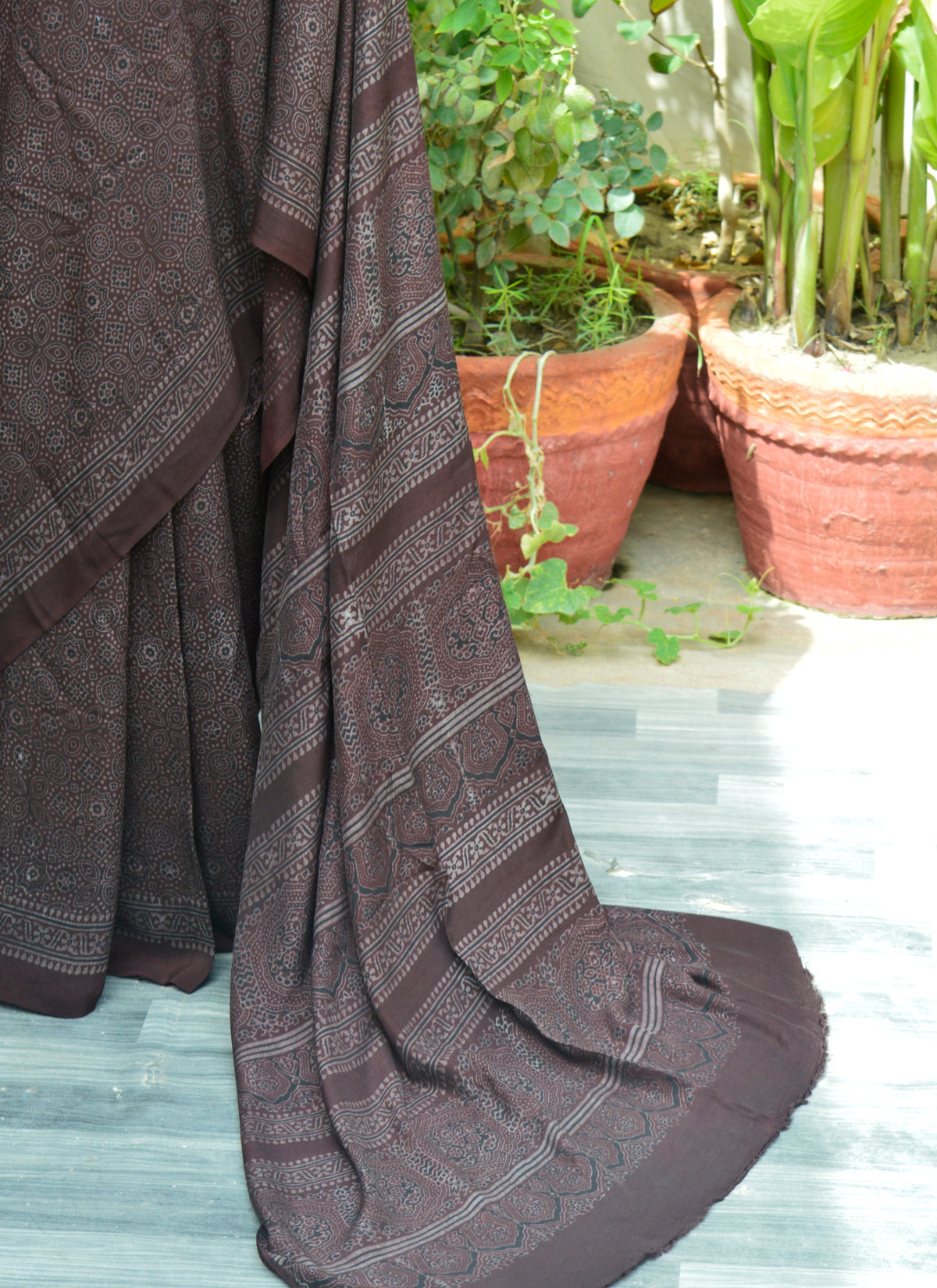 Elegant Sindhi Ajrak Saree in black and raspberry hues printed on raw silk
