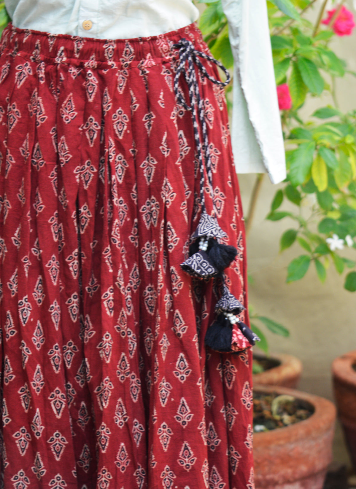 Premium Ajrak lawn maxi skirt maroon floral butta pattern with handmade tassels