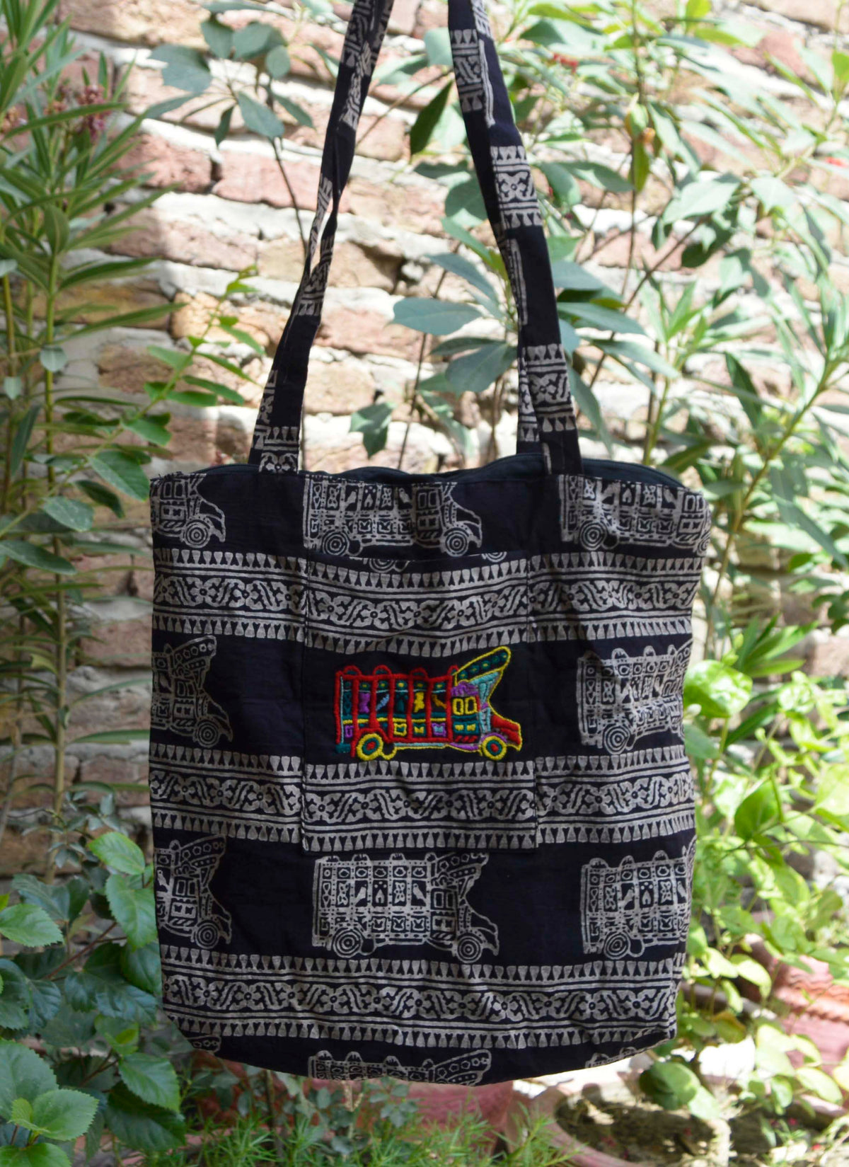 Handmade Ajrak tote with colorful truck art embroidery Pakistan