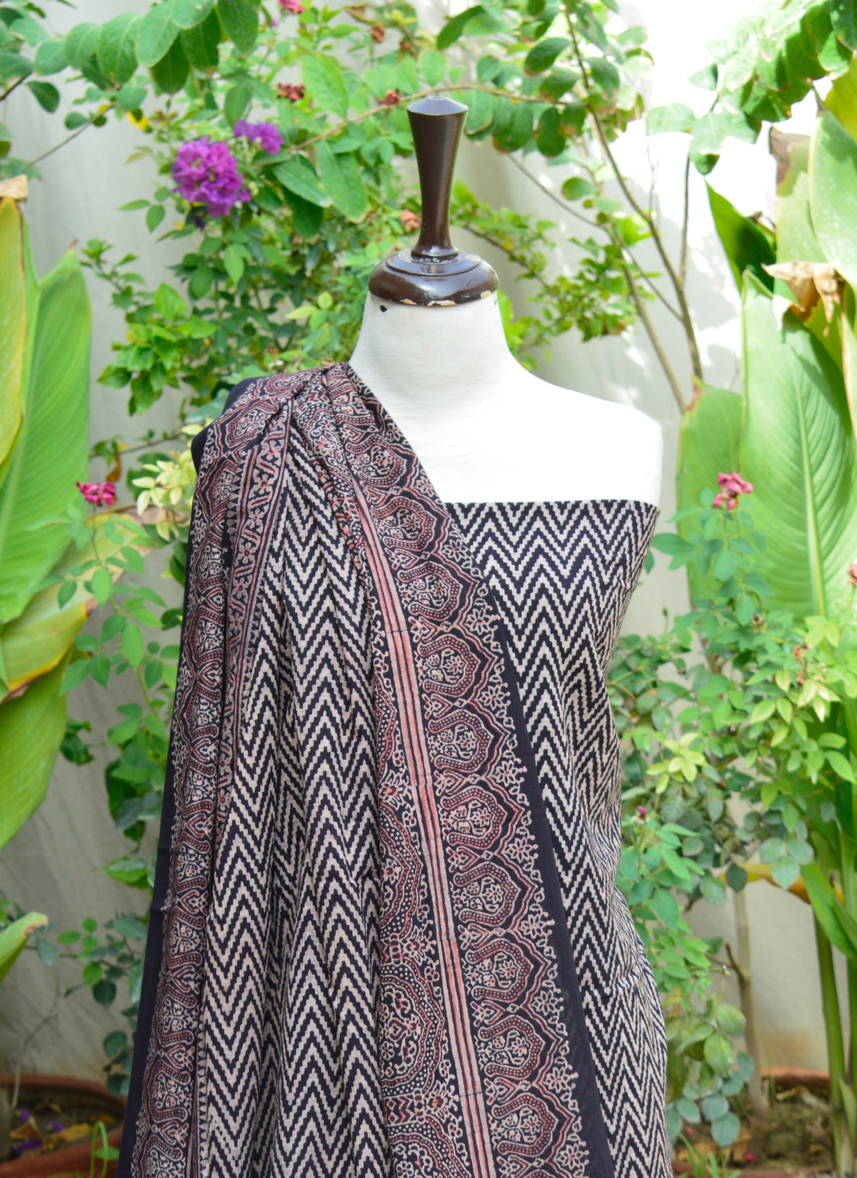 Close-up of Handcrafted Ajrak Zigzag Print – Intricate Artisan Block Printing on Soft Lawn Fabric.
