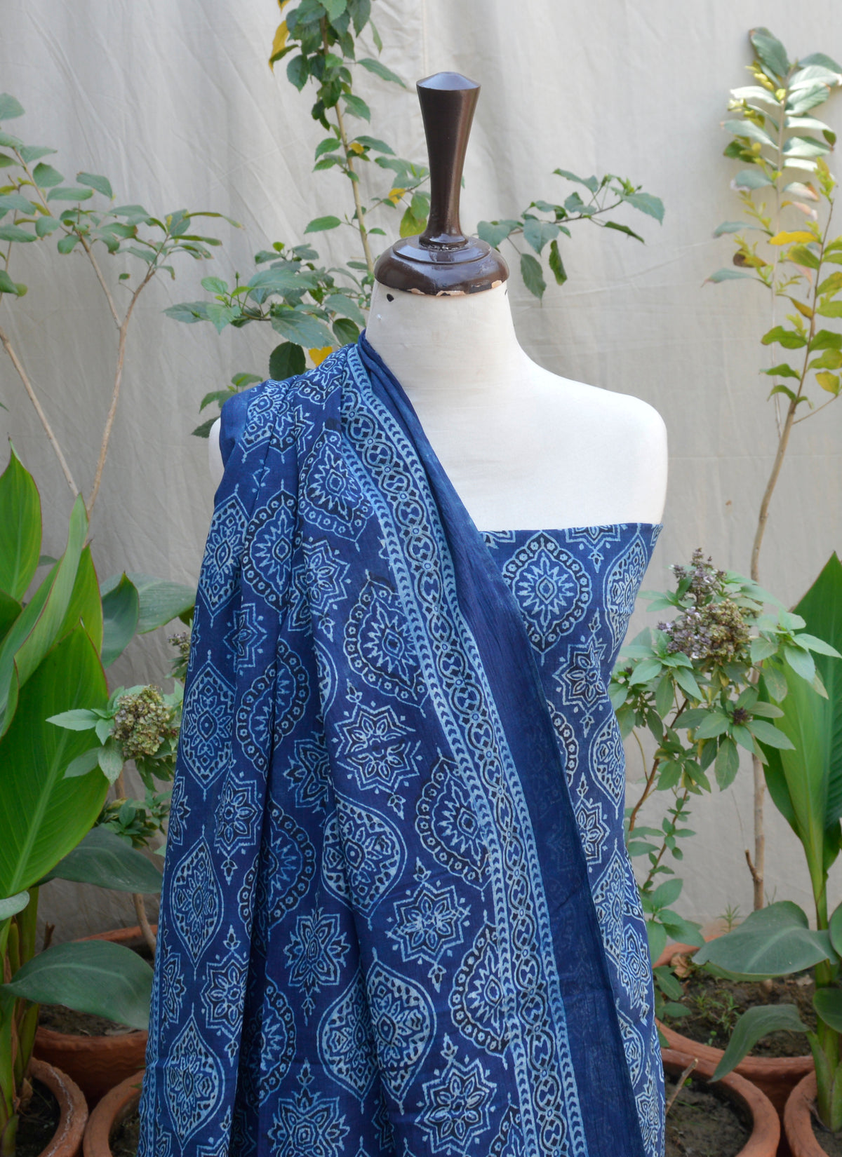 Organic Dye Ajrak Print Lawn Fabric – Traditional Indigo Badam Design for Sustainable Fashion.