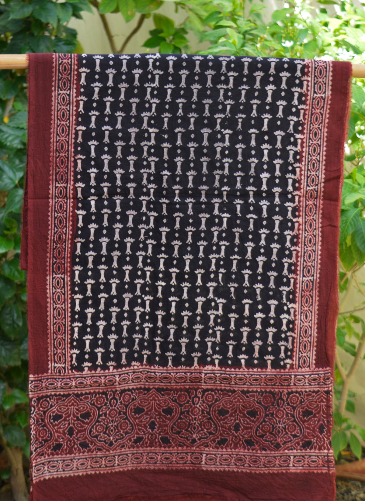 Lightweight lawn Ajrak scarf featuring traditional Black Bone artisan motifs