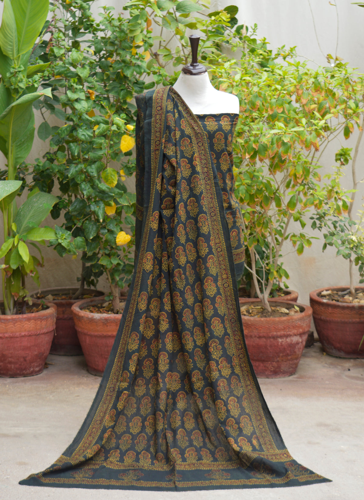 Women's unstitched Ajrak lawn two-piece in green floral butta design with maroon filling, organic dye hand block printed premium fabric