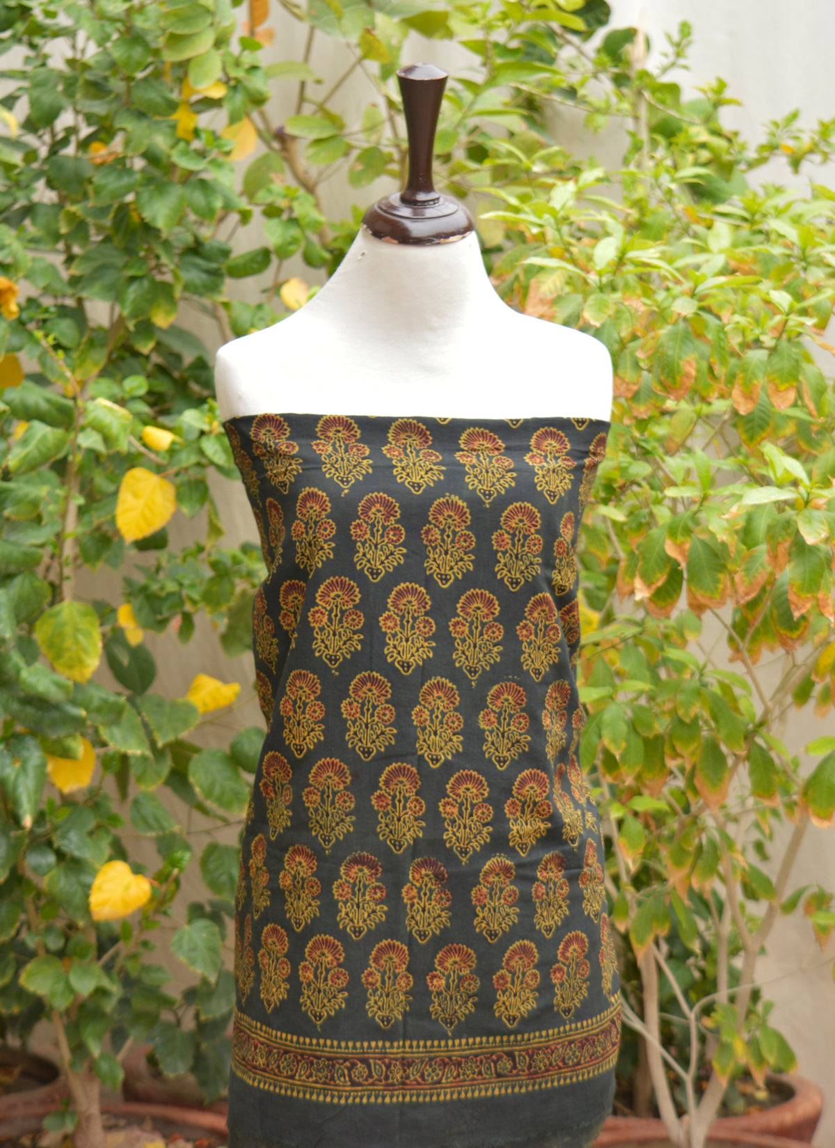 Traditional Sindhi Ajrak green floral butta shirt and dupatta set in breathable lawn fabric with authentic artisan hand block print