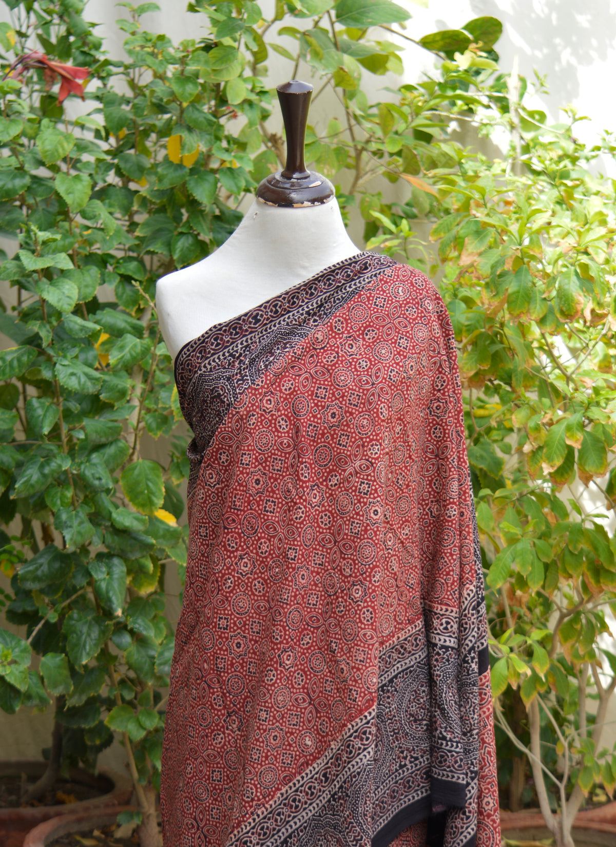 Traditional Sindhi Ajrak red saree in premium lawn fabric with matching blouse, organic dye hand block print, lightweight and breathable for festive wear