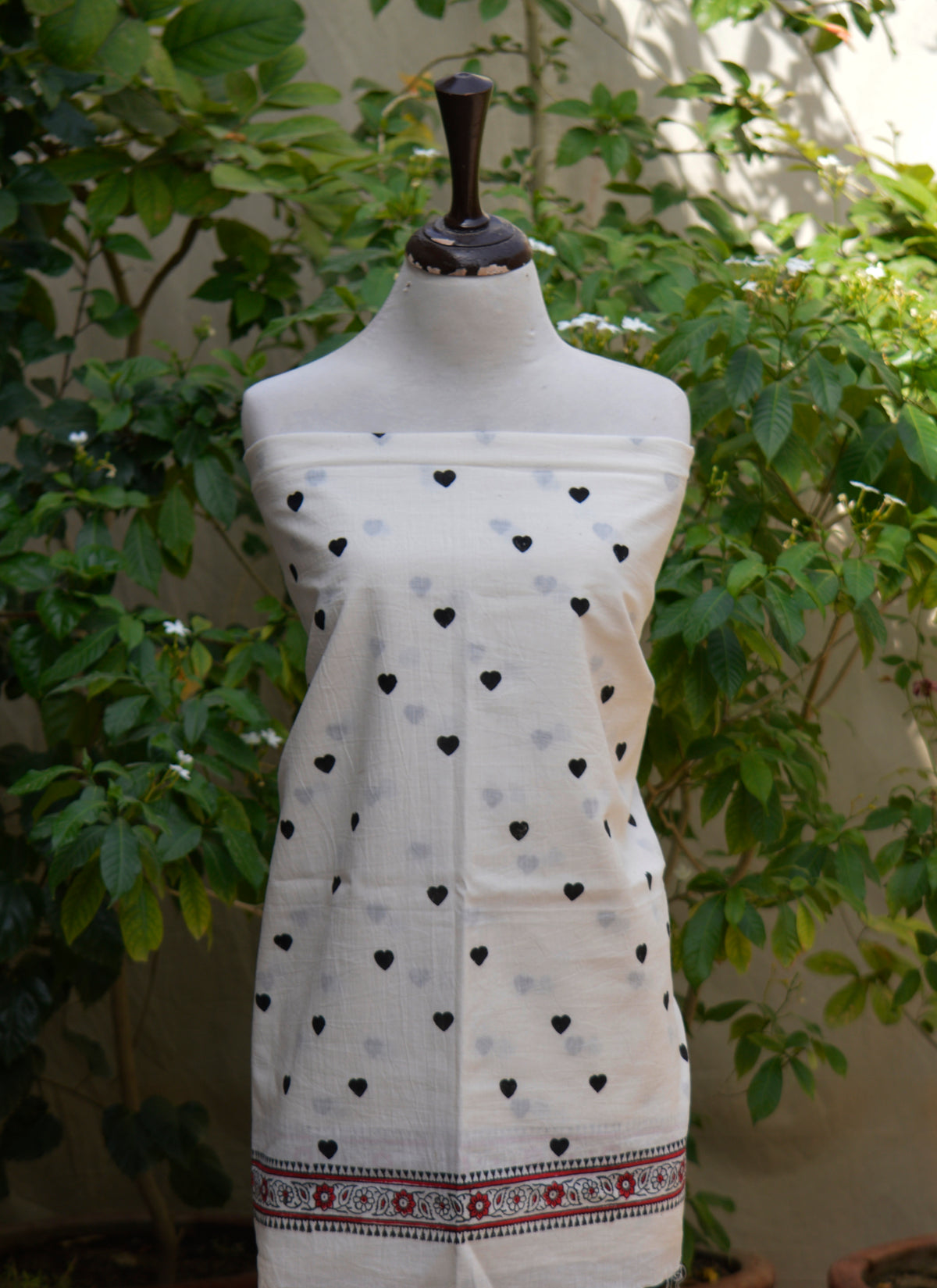 Black cotton unstitched dress fabric with artistic love heart block print