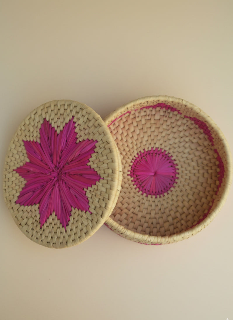 Eco-friendly palm-leaf roti dan pink floral pattern for serving bread and snacks