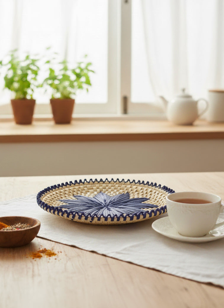 Hand-woven dark blue palm-leaf changair (10×10-inch) with geometrical floral design for bread, roti or fruit