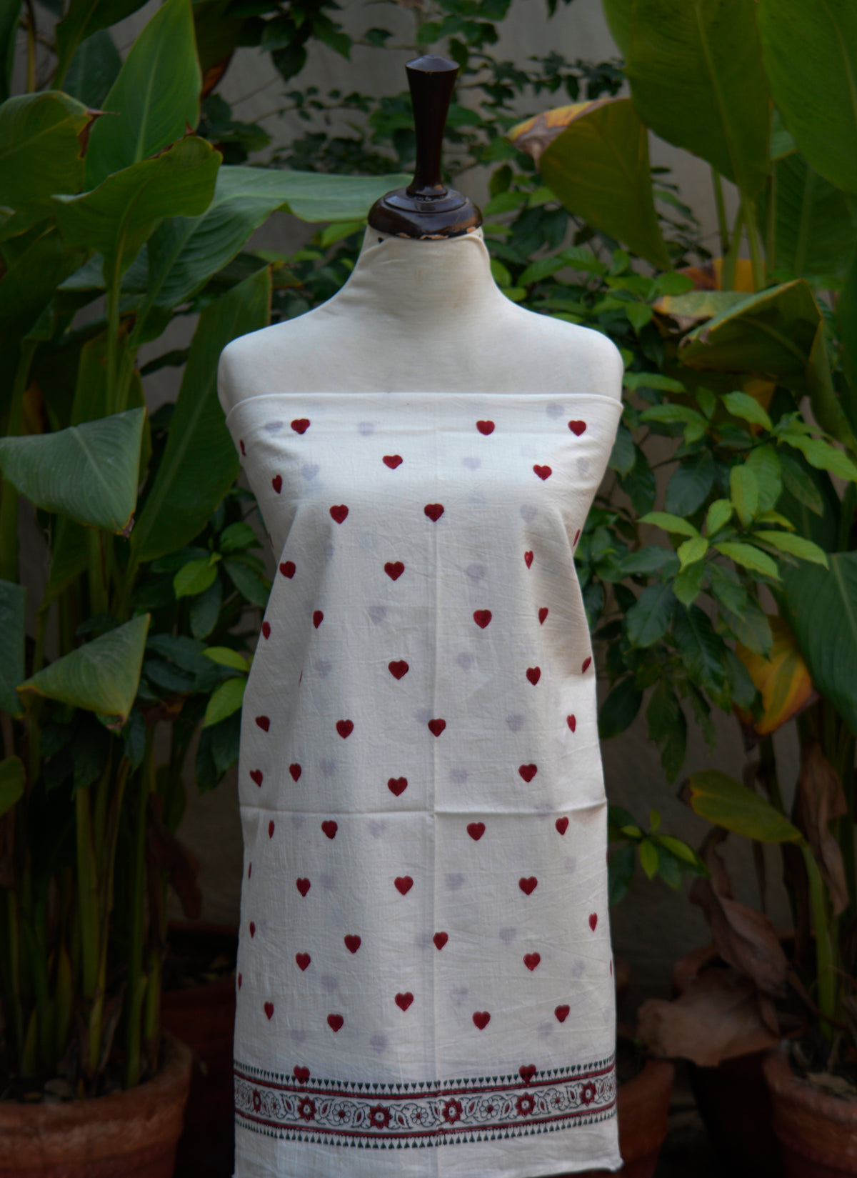 Artisan hand block printed heart motif dress in white cotton fabric Pakistan