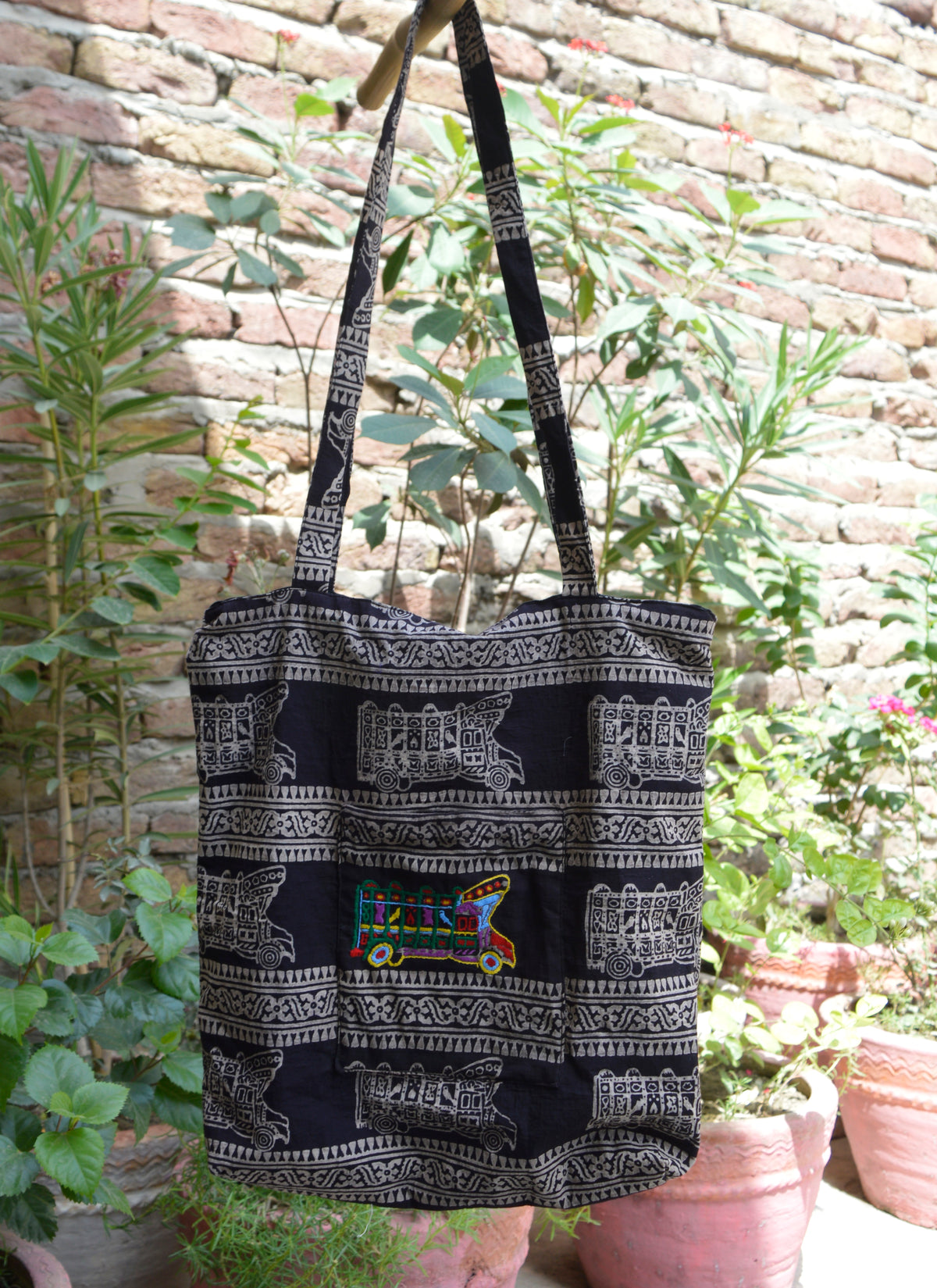 Black Ajrak bag with neon embroidery Pakistan
