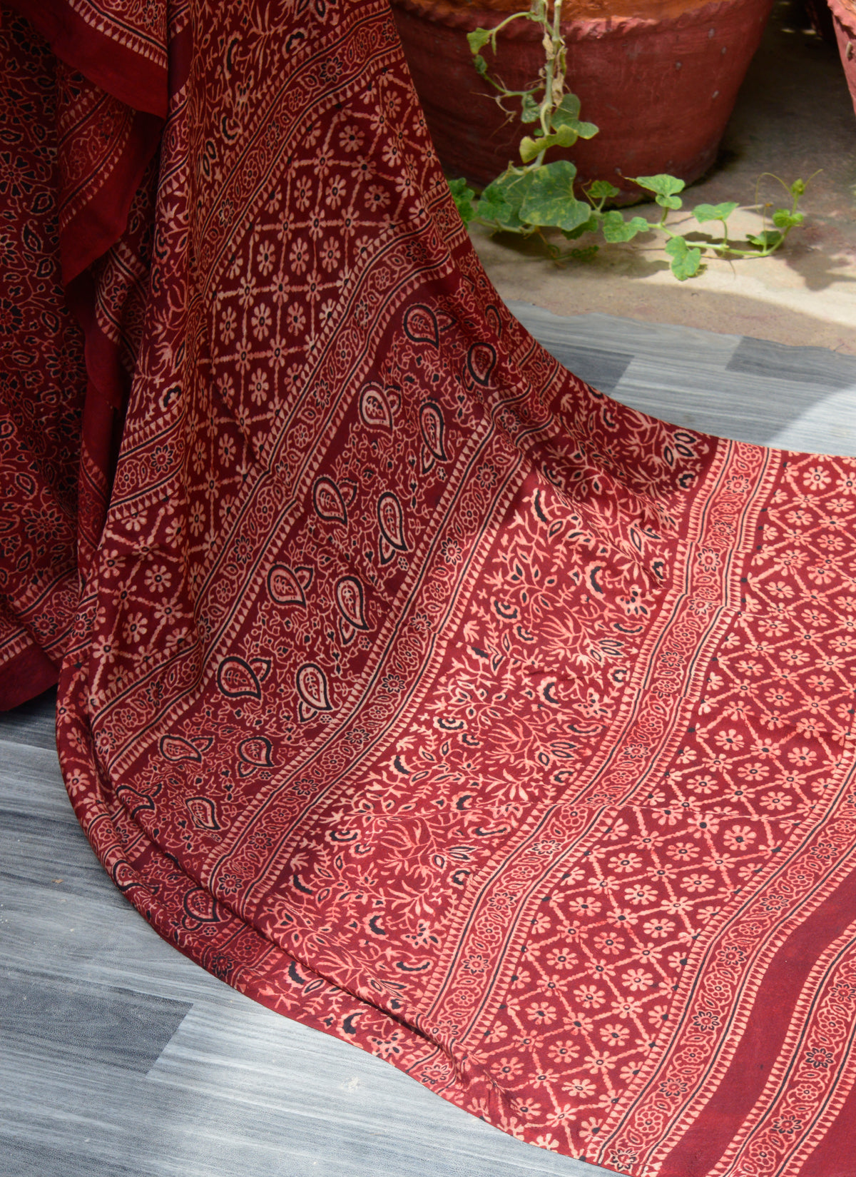Elegant Ajrak Silk Saree Maroon – handcrafted cultural attire from Pakistan