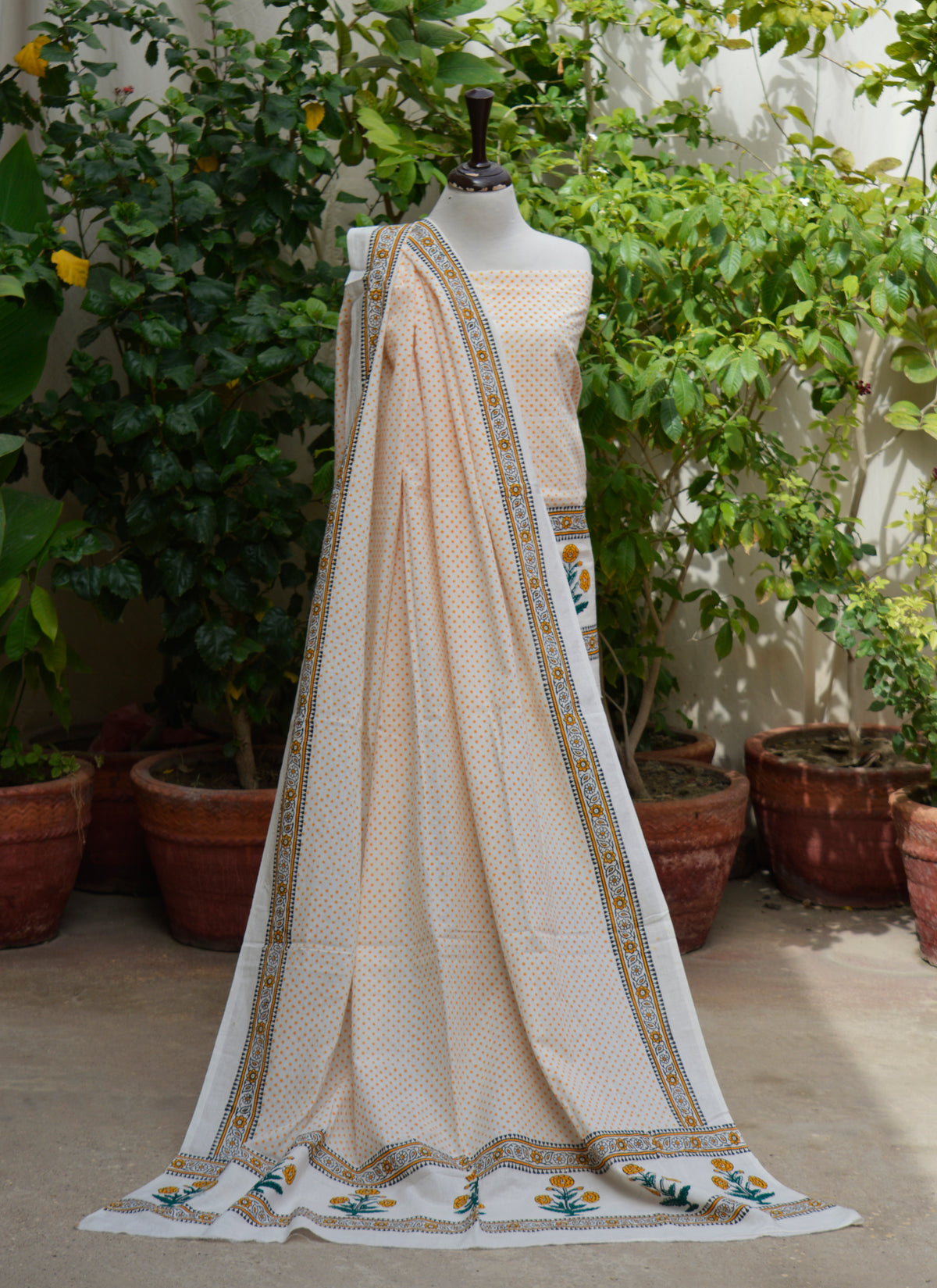 Women's unstitched shirt and dupatta set in cotton with floral butta border and golden yellow motifs