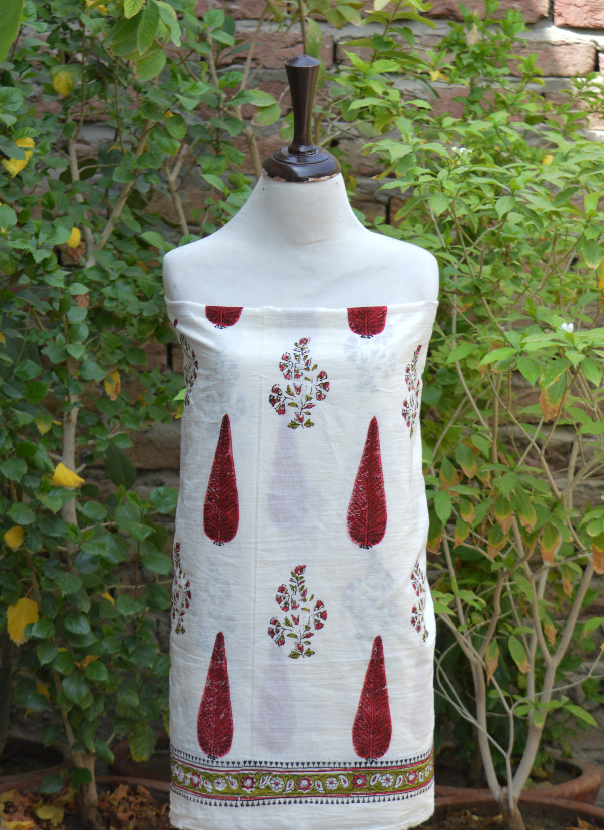 Unstitched cotton shirt and dupatta featuring red parrot green natural floral leaf Sanganeri design
