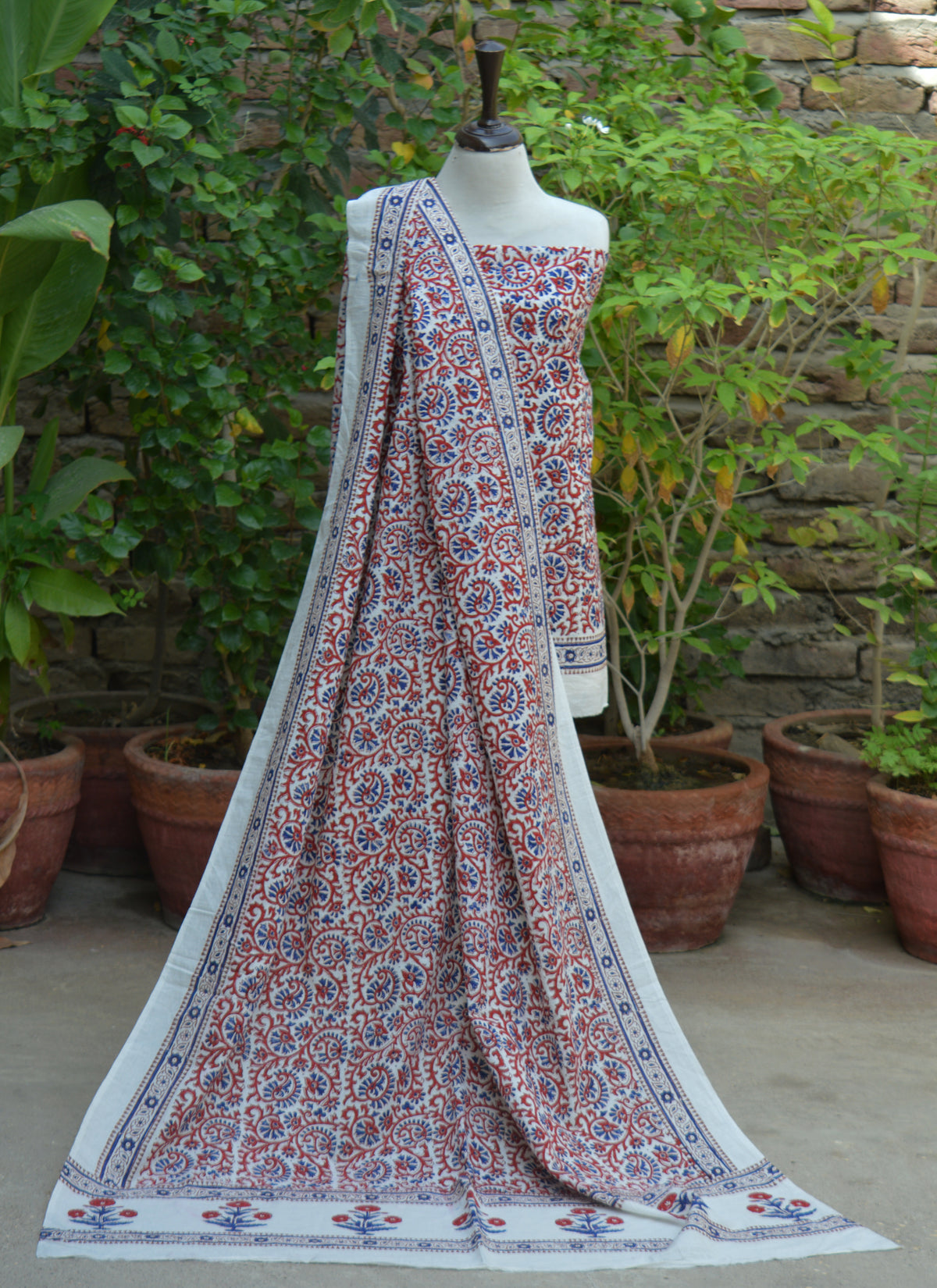 Women's hand block printed cotton two-piece with elegant red and blue floral bel design