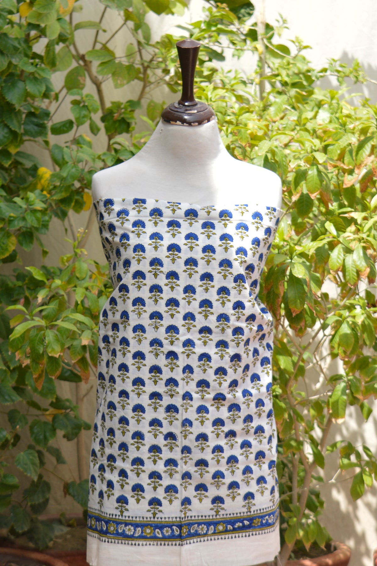 Handmade floral block print three-piece cotton dress with coordinated stripe dupatta
