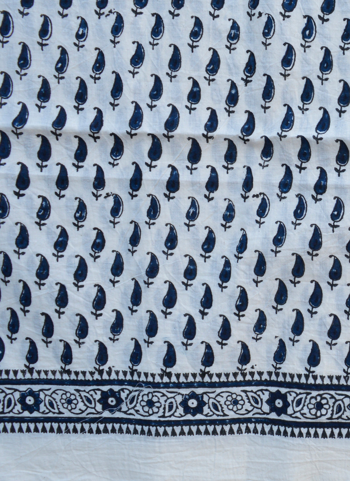 Close-up of Kerry Dark Blue Hand Block Printed Cotton Fabric, highlighting the detailed motifs and premium cotton texture.