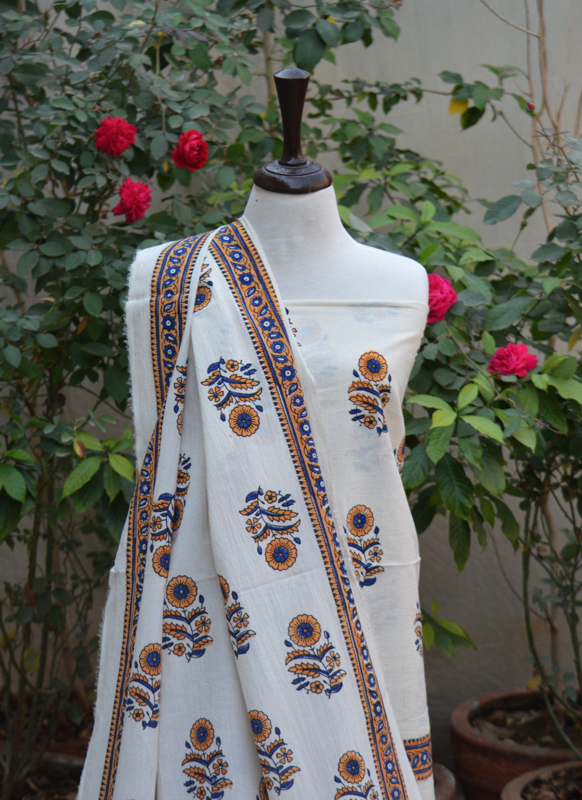 Hand block print orange lawn two-piece dress with margarita floral design Pakistan