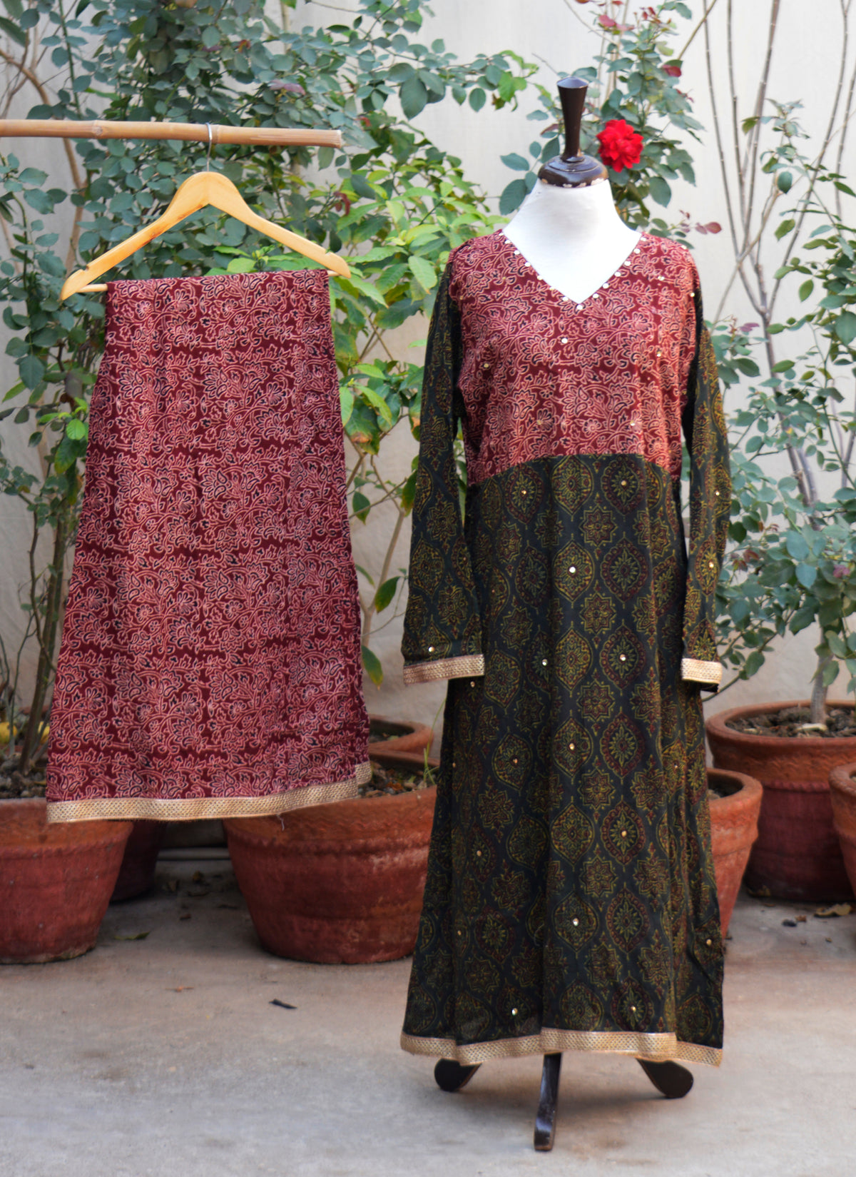 Green and maroon stitched Ajrak design dress with sitara sequences and gotta lace frock and plazo festive wear Pakistan
