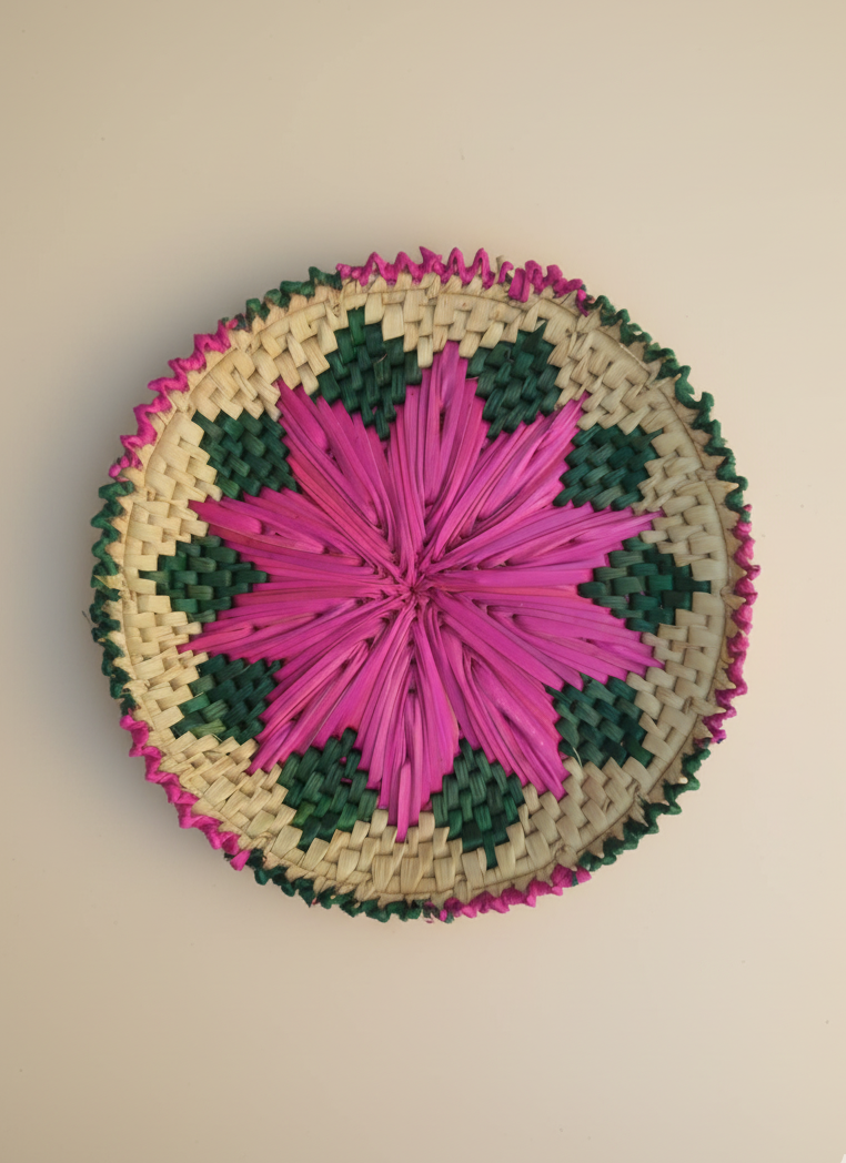 Eco-friendly handmade roti plate with colorful flower design for dining decor.