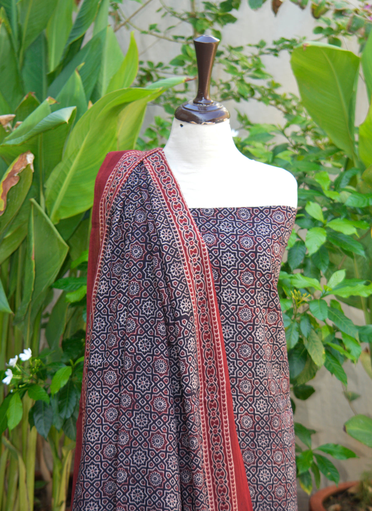 Unstitched Ajrak design dress in black Moroccan contrast, organic dye hand block printed shirt and dupatta set for women Pakistan.