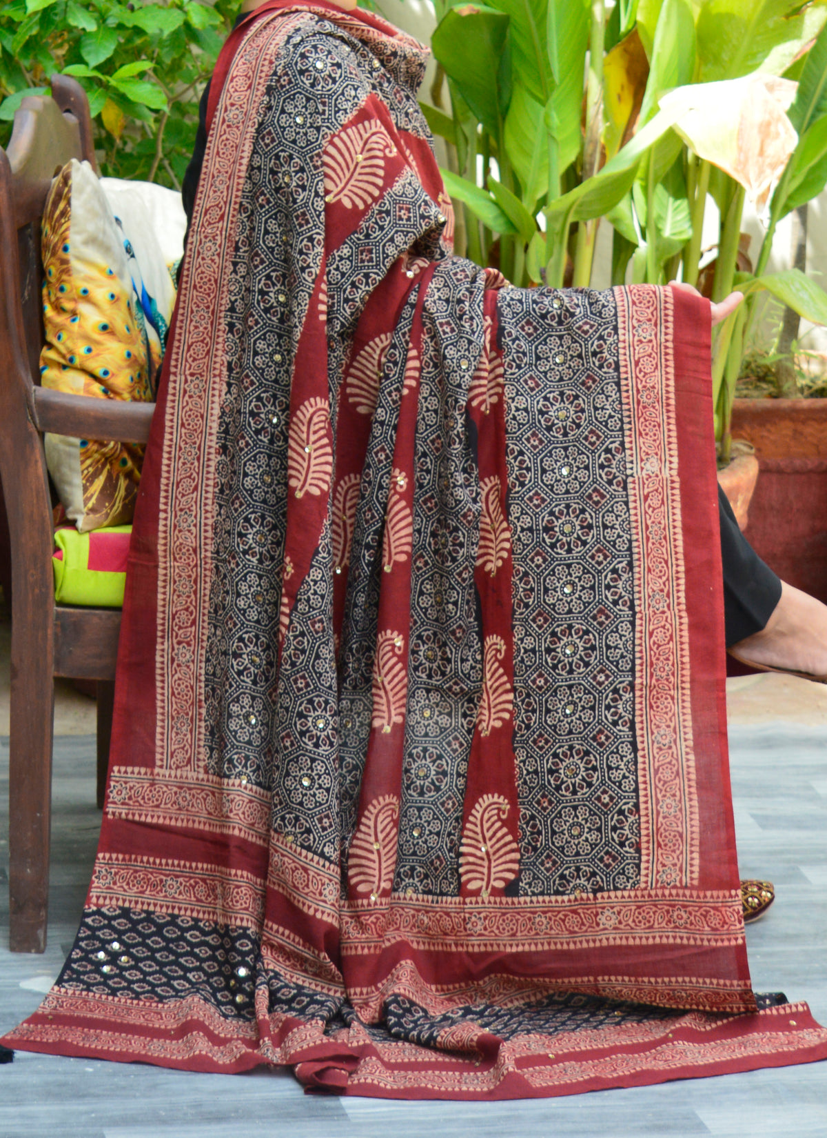 Organic dye hand block printed Ajrak Chaadar with leafy design, hand-stitched sitara studs, and thread tassels