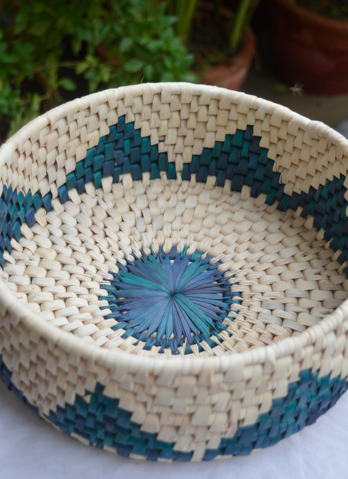 Eco-friendly palm leaf basket for bread, roti, or fruit serving, handmade in Ferozi shade.