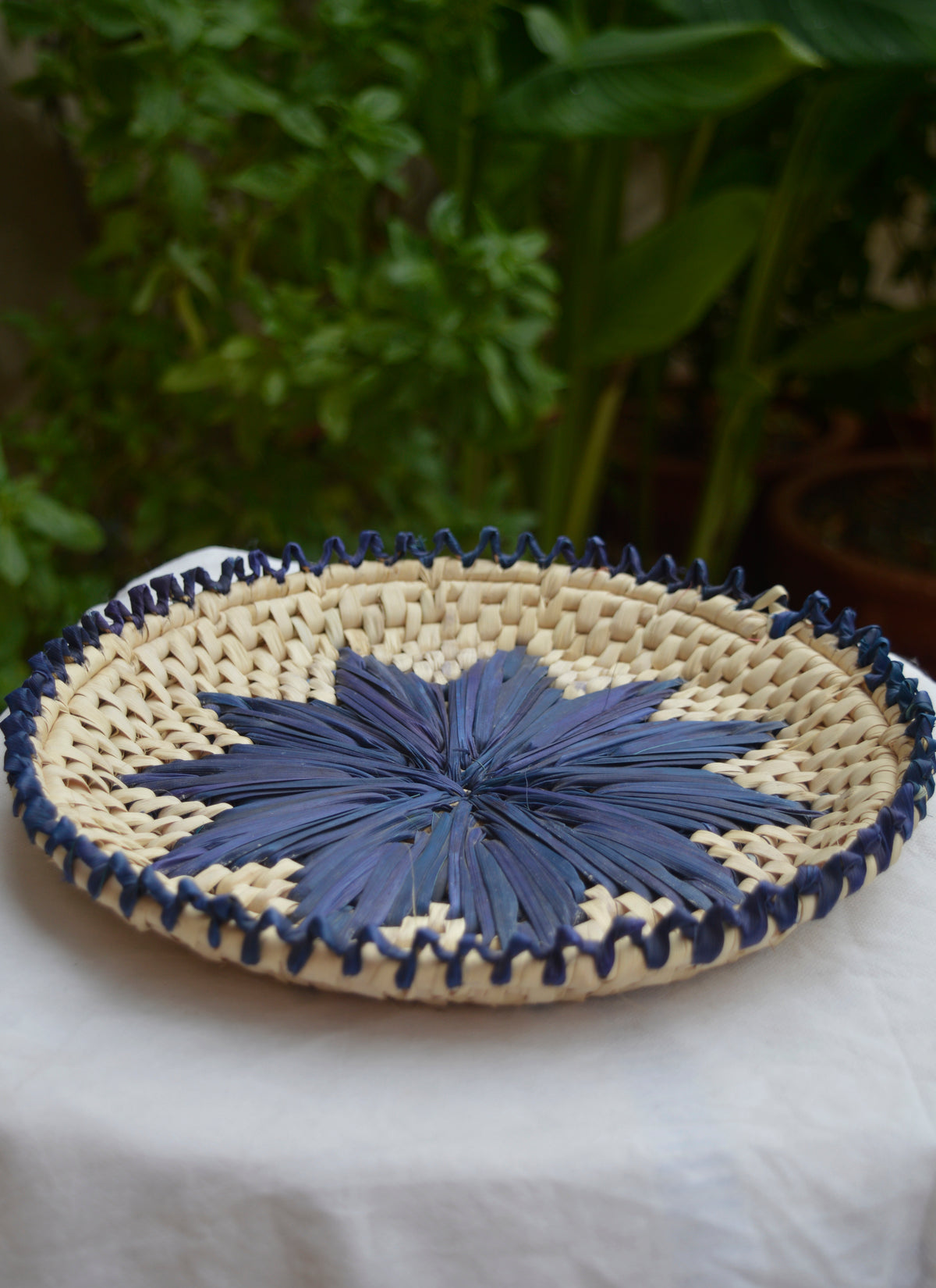 Eco-friendly palm leaf bread plate changair, handmade in dark blue.