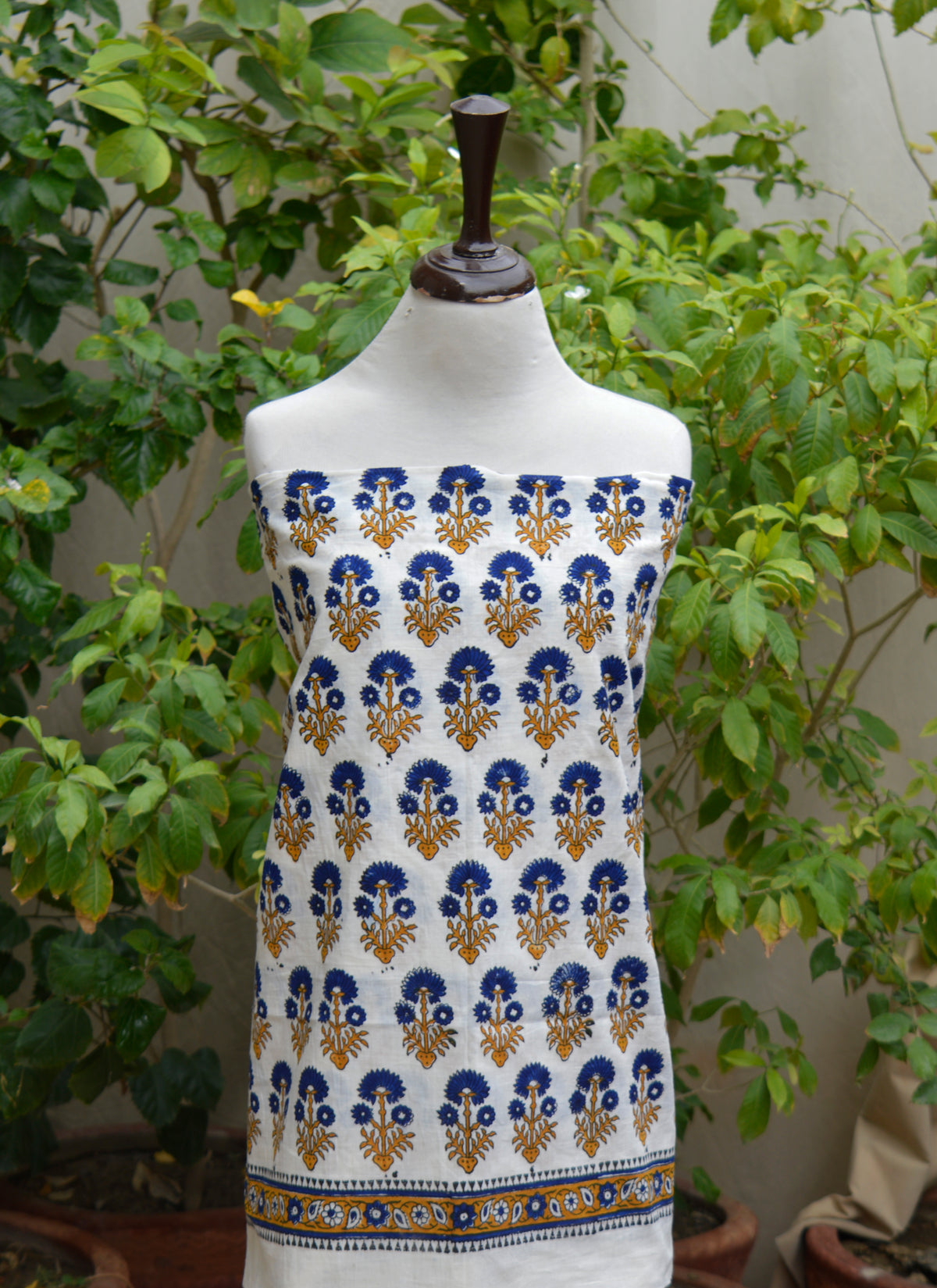 Traditional hand block printed cotton dress material with blue floral motifs and dupatta