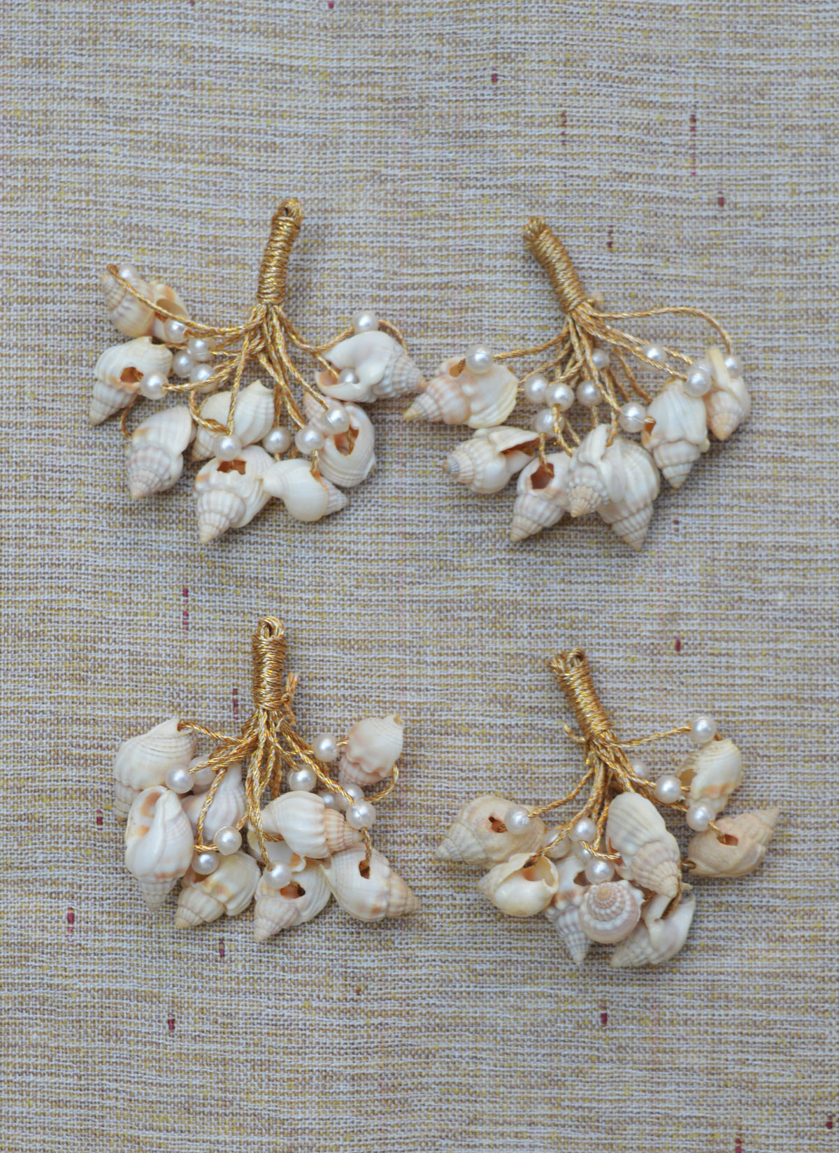 Artisan made sea shell tassel accessories for clothing and décor