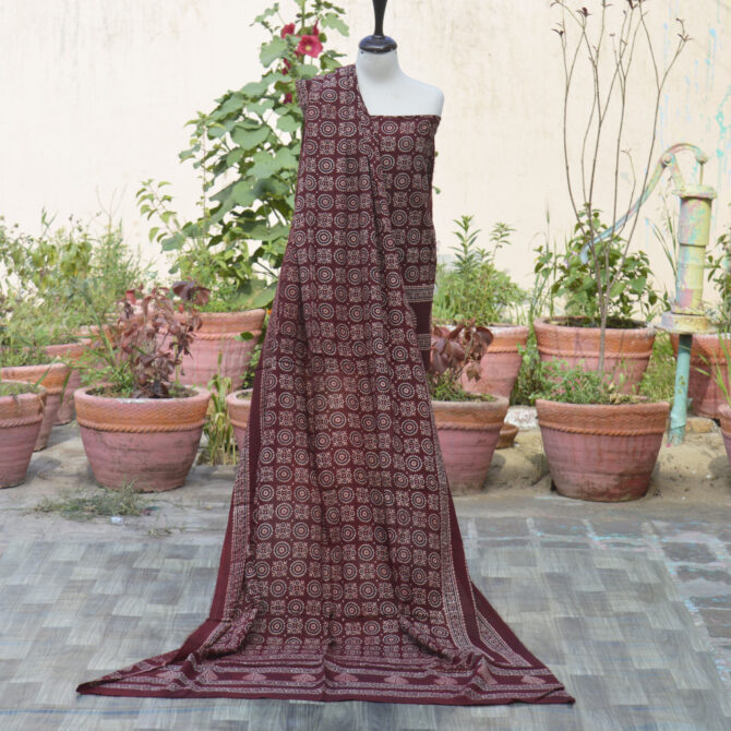 Handcrafted Ajrak Red MJD unstitched two-piece with rich patterns and eco-friendly organic dyes.