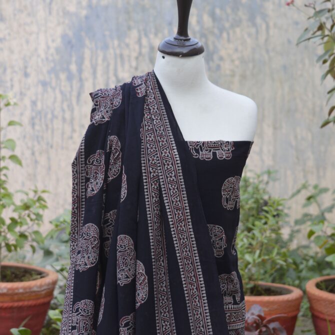 Ajrak Elephant, Close-up view of the hand block-printed shirt featuring intricate elephant motifs and geometric designs in deep black, showcasing traditional Ajrak craftsmanship.