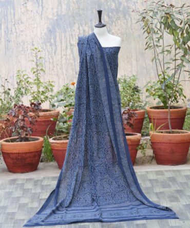 Organic dye hand block printed Ajrak indigo two-piece set featuring a Chinar leaf design. Includes an un-stitched shirt and dupatta, showcasing traditional craftsmanship and modern elegance.