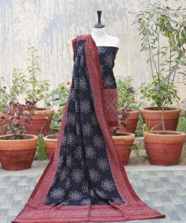 Front view of the Organic Dye Hand Block Printed Ajrak Black Starry Un-Stitched Two-Piece featuring intricate floral and geometric patterns in deep black and maroon.