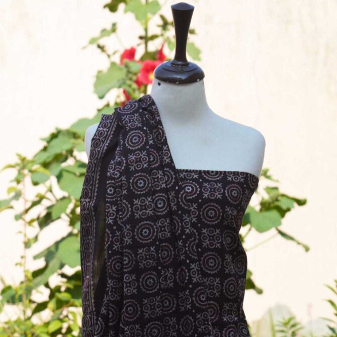 Close-up of Ajrak Black MJD shirt and dupatta with hand block printed designs in deep black, showcasing traditional craftsmanship.